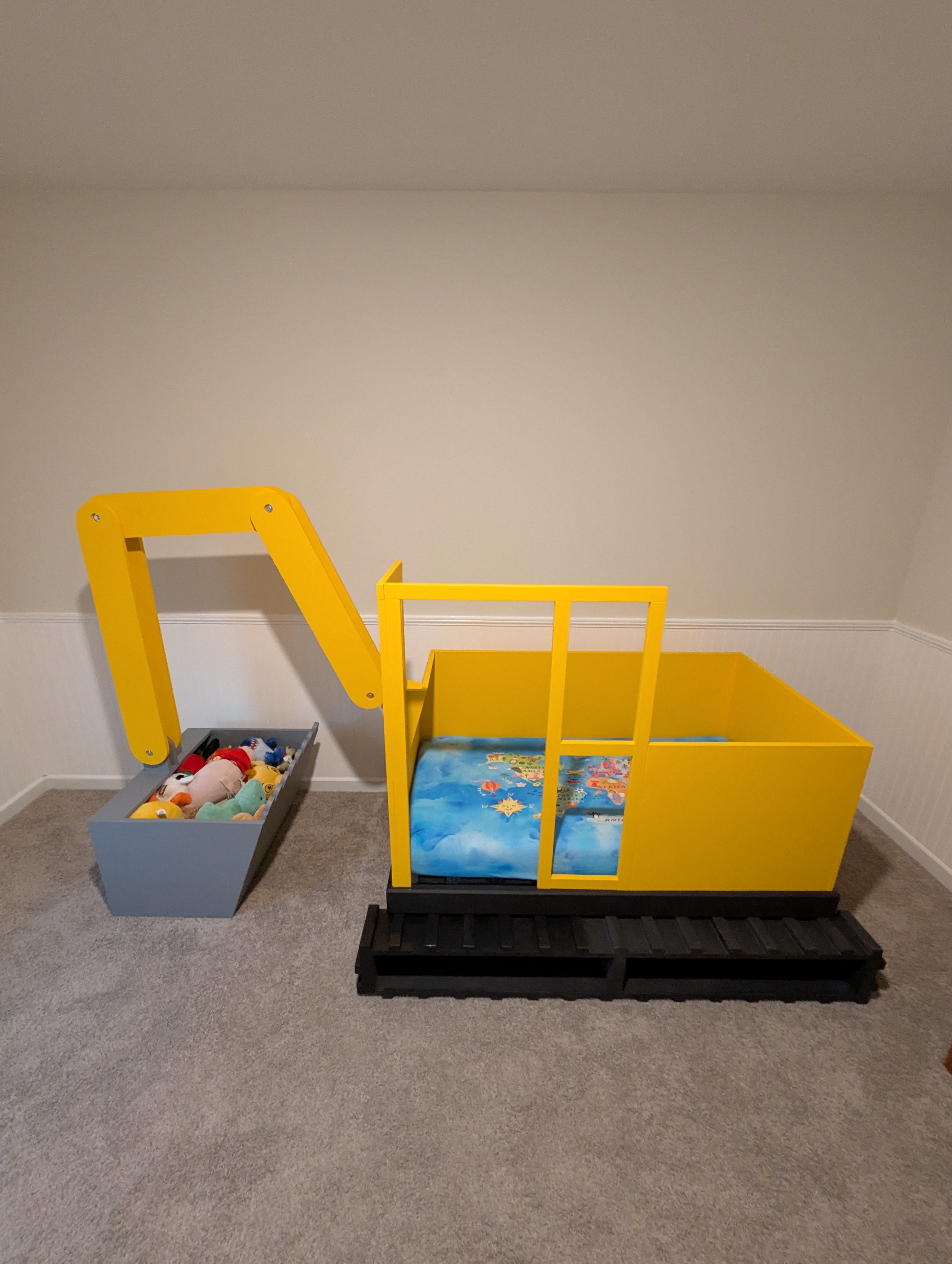 Side view showing the boom arm and cab